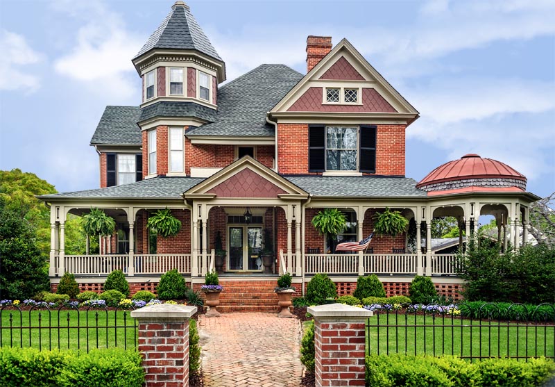 Victorian house with exterior shutter styles.